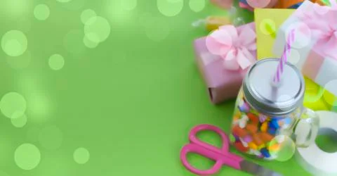 Banner Festive composition set of gift boxes with balls candy cocktail materi Stock Photos