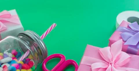 Banner Festive composition set of gift boxes with balls candy cocktail materi Stock Photos