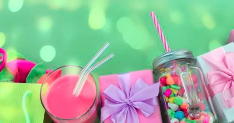 Banner Festive composition set of gift boxes with balls candy cocktail materi Stock Photos
