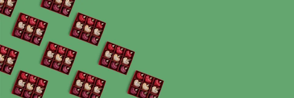 Banner with frame made of boxes with New Year decorations pattern. Stock Photos