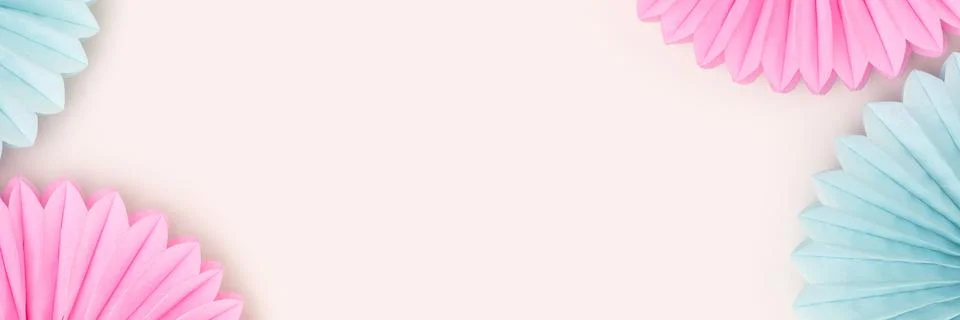 Banner with frame made of tissue paper fans in a blue and pink colors. Stock Photos