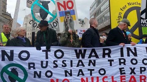 Banner in front of march London support ukraine russian invasion Stock Footage 171484572