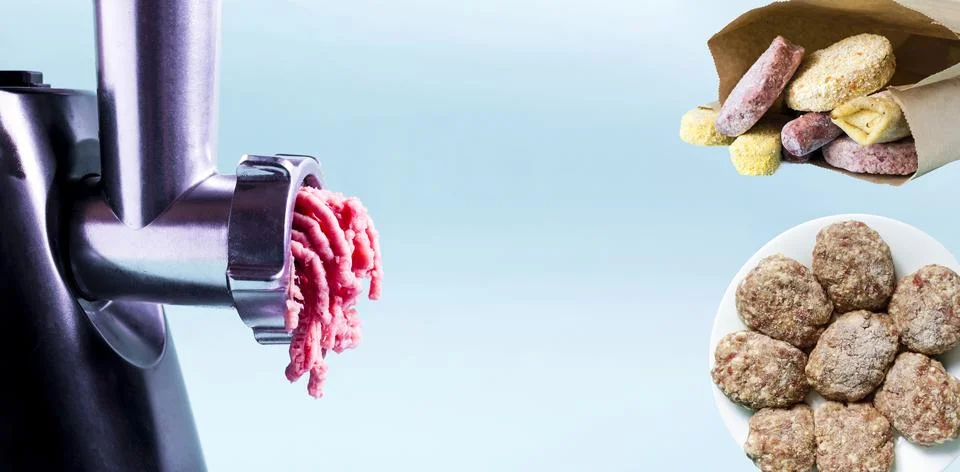 The banner has a light background with a working meat grinder Stock Photos