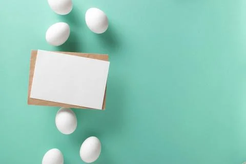 A banner with an image of eggs on a light blue background. Space for text. Stock Photos