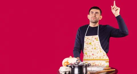 Banner, long format over red background. Confident young man showing forefinger 写真素材