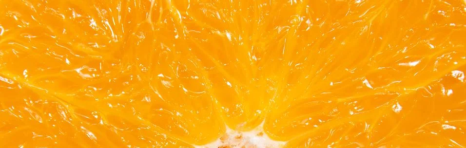 Banner of orange pulp texture background. Macro. Panaramic image Stock Photos
