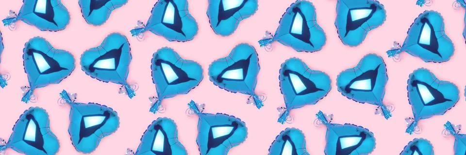 Banner with pattern made of blue inflatable balloons in a heart shape. Stock Photos