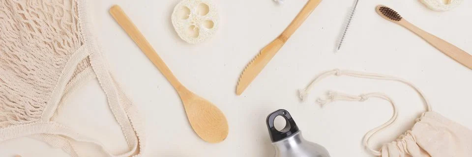 Banner with pattern made of zero waste items on a beige background. Stock Photos