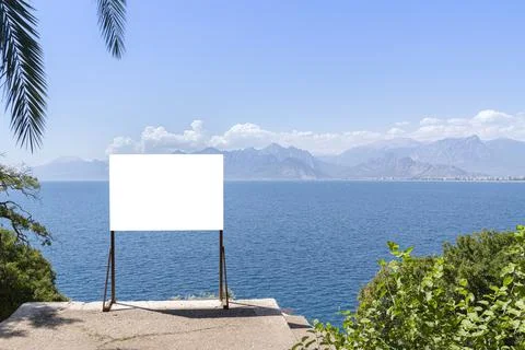 Banner on the seashore. an empty mockup is an object for announcements about Stock Photos
