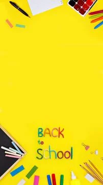 Banner words of multi-colored plasticine back to school, black chalk board and Stock Photos