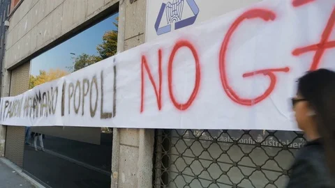 Banners against GMOs during march against G7 Ministerial Meeting on Agricultu Stock Footage 81612800