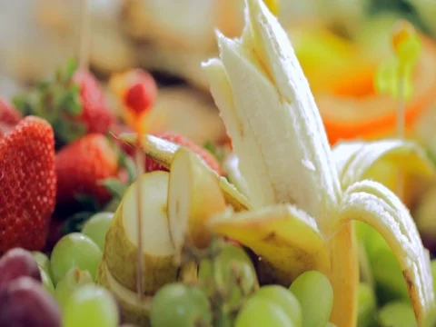Banquet: fruit, fish and meat closeup Stock Footage 75803482