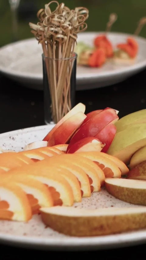 Banquet hall empty with table setting with glasses, dishes and plates, before Stock Footage 252267765