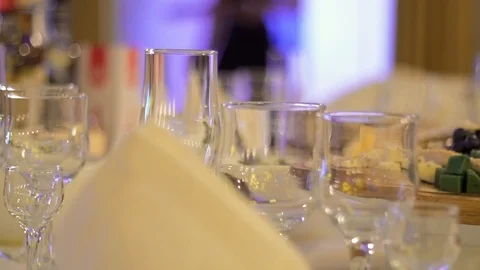 Banquet table with glasses Stock Footage 98222634