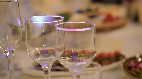 Banquet table with glasses Stock Footage 98224881