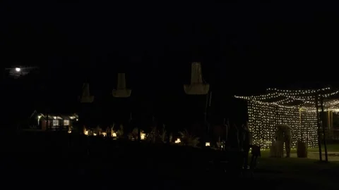 Banquet table outside at night Stock Footage 163038773