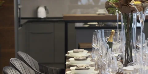 Banquet table set with glasses for an event party or wedding arrangement at home Stock Footage 149231935