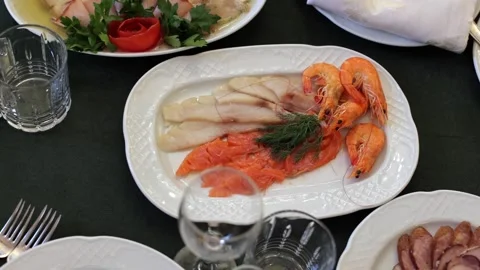 Banquet table, there are different dishes at the celebration Stock Footage 331524245