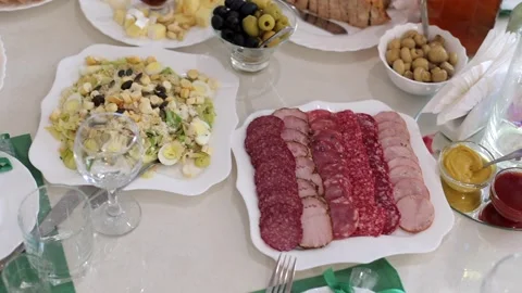 Banquet table, there are different dishes at the celebration Stock Footage 331524252