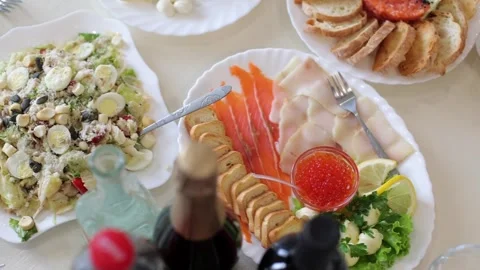 Banquet table, there are different dishes at the celebration Stock Footage 331524254
