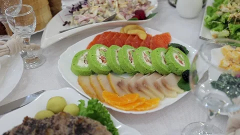 Banquet table, there are different dishes at the celebration Stock Footage 331524255