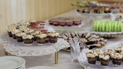 Banquet table, there are various sweet snacks at the celebration. Buffet table Stock Footage 331524218