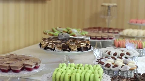 Banquet table, there are various sweet snacks at the celebration. Buffet table Stock Footage 331524227
