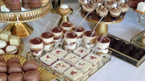Banquet table, there are various sweet snacks at the celebration. Buffet table Stock Footage 331524229
