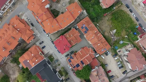 Bansko Bulgaria aerial top down drone view of orange tile roofs Stock Footage 343647828