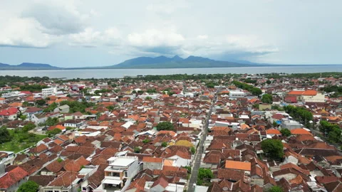Banyuwangi East Java Indonesia Local Neighborhood Bali Island In Distance Drone Stock Footage 342826791