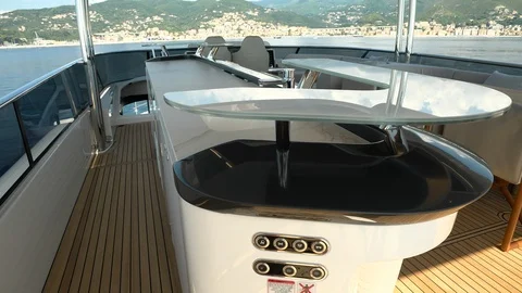 Bar and cocktail area on the upper deck of a yacht. Stock Footage 124249390