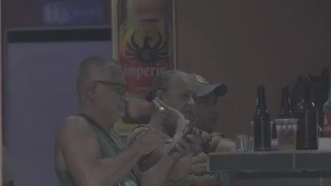 A bar and its customers in San José, Costa Rica Stock Footage 344341705