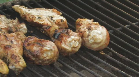Bar-B-Q Chicken on the grill paning left clip 6 Stock Footage 540101
