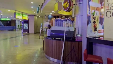 A bar with a bar stool and a bar with a neon sign Video stock 291926475