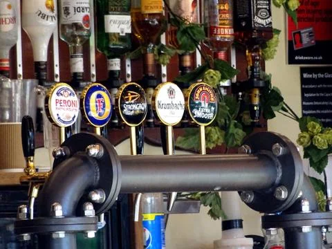 Bar Beer Taps And Drinks Bottles Stock Photos