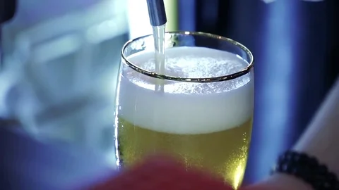 In a bar close-up poured beer Stock Footage 85435662