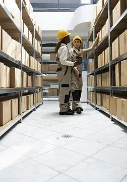 Bar code scanning for logistics handled by trained diverse staff Foto stock