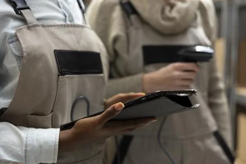 Bar code scanning for logistics handled by trained diverse staff Stock Photos