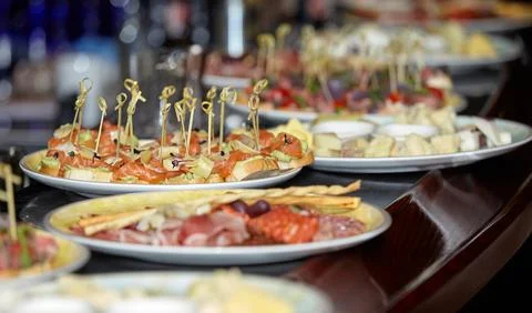Bar counter with appetizers for a buffet table Stock Photos