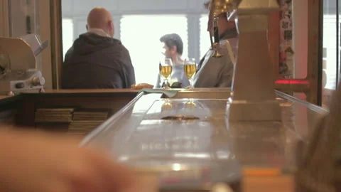 Bar Counter Draft Beer Taps with Patrons Drinking in Background Stock Footage 347266678