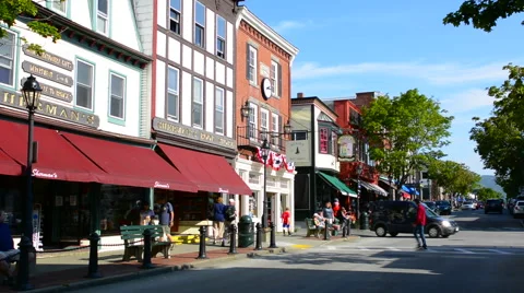 Bar Harbor Maine Main Street traffic and shops with tourists and fall color Stock Footage