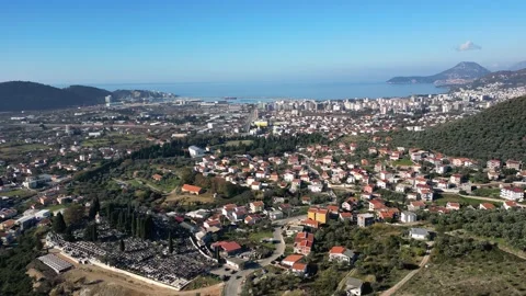 Bar, Montenegro. Panoramic drone shot of city buildings, sea and harbor Stock Footage 259892128