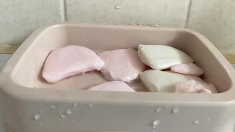 Bar of old soap pieces on plastic container in bathroom. Hygiene Stock Footage 250146338