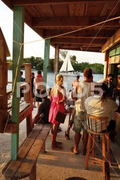The bar scene at the Lazy Lizard Stock Photos