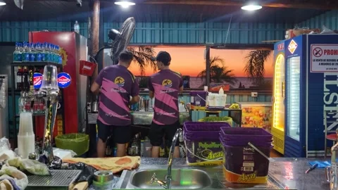 Bar scene at Playa San José in Encarnación, Paraguay, overlooking the Paraná Stock Footage 340944335
