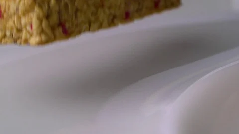  Bar from serial and barries go into yogurt bath 1e Stock-Footage 81823446