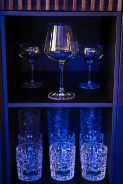 Bar shelf with glass cups Stock Photos
