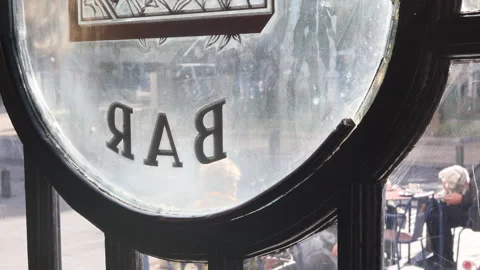Bar sign in a bar window seen from the inside. Stock Footage 224887765