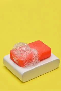 Bar soap with bubbles Stock Photos