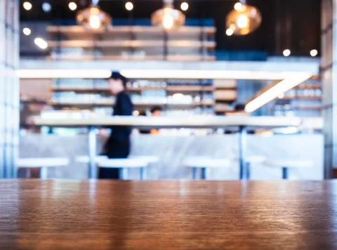 Bar Table Top Restaurant Interior with People Background Stock Photos